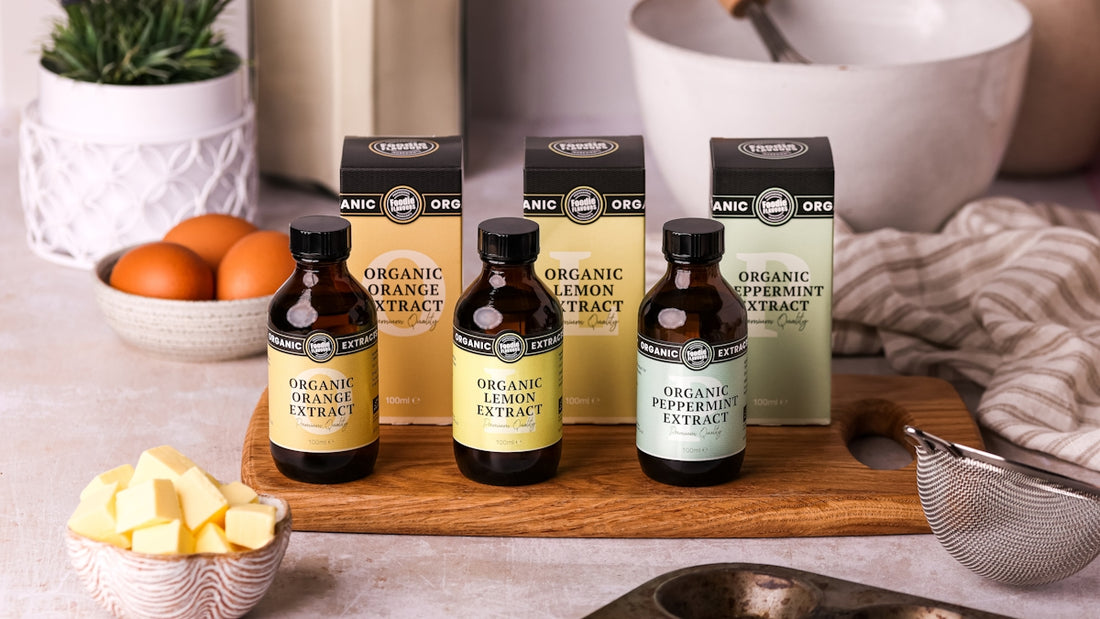 Three bottles of organic extracts with baking ingredients.