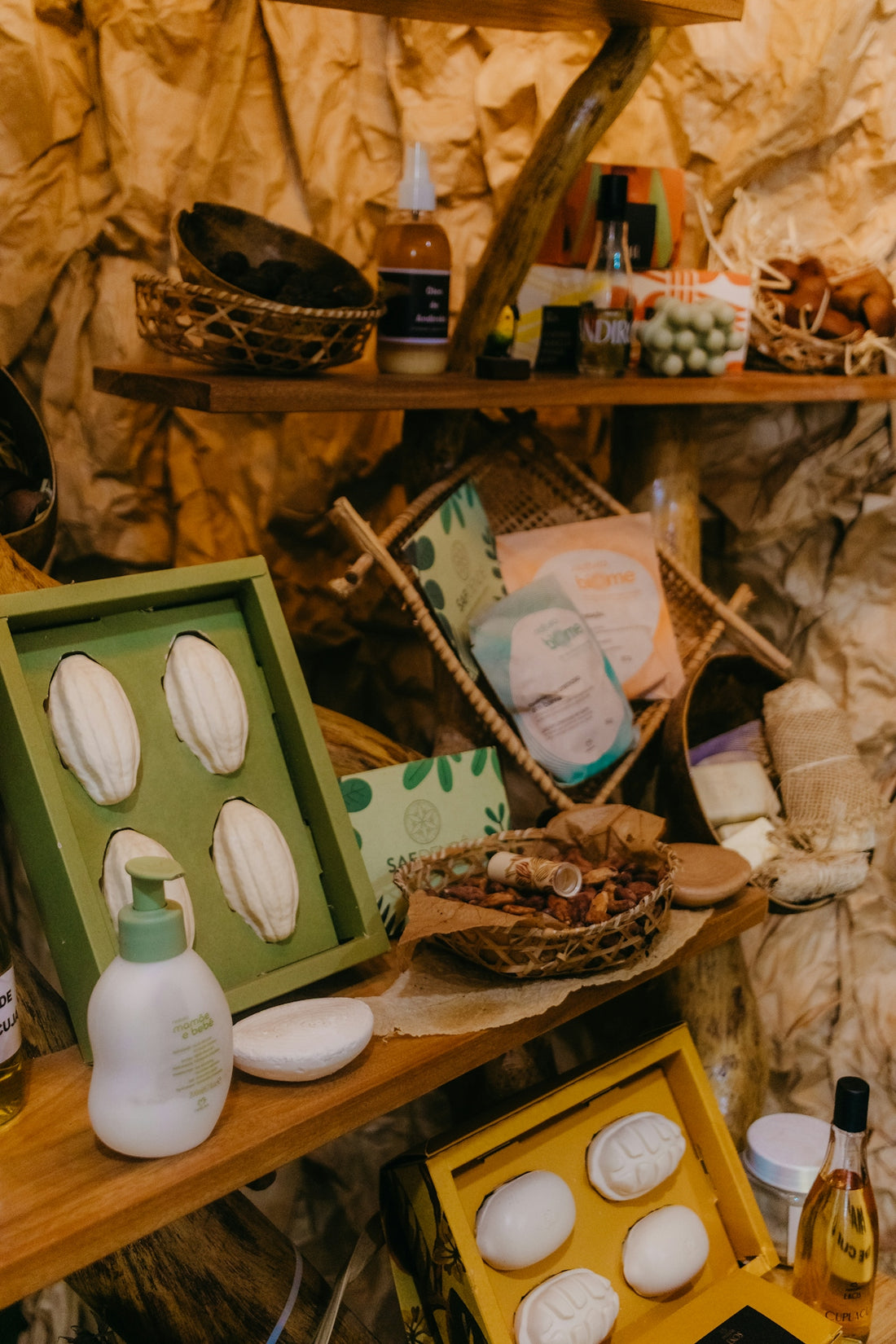 Handmade soaps and natural beauty products displayed on wooden shelves